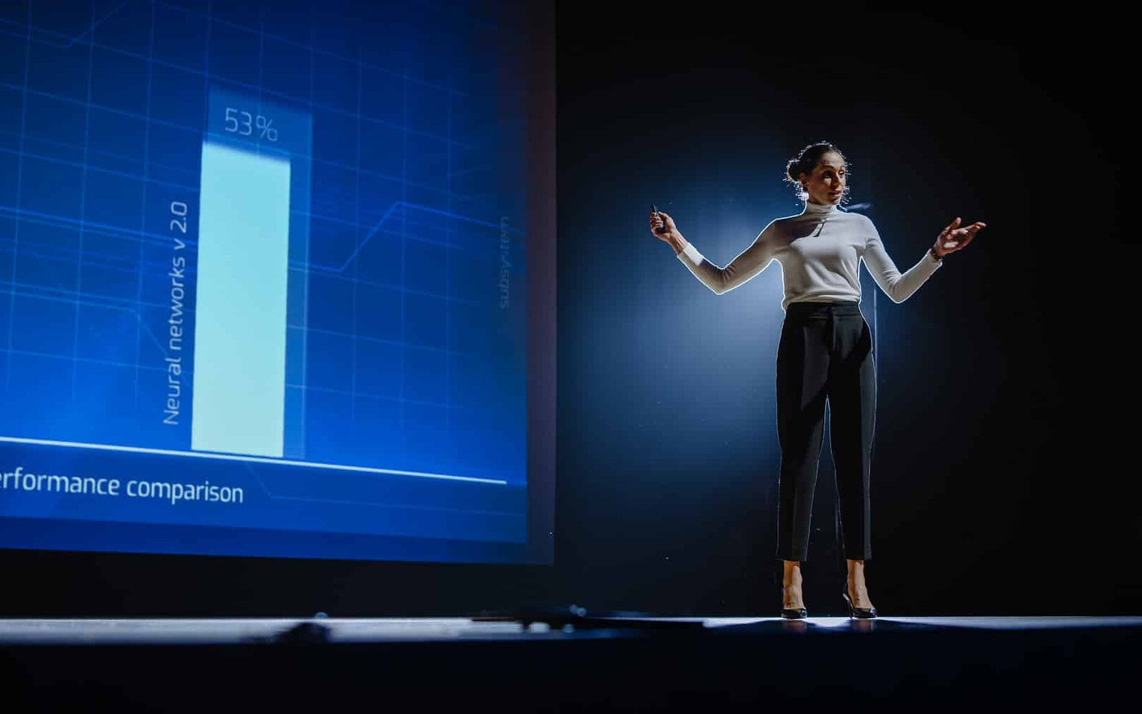 A speaker presenting to an investor audience